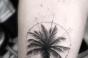 Tatuaj de palmier pe brațul unei fete